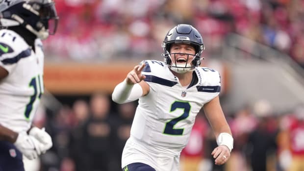 Dec 10, 2023; Santa Clara, California, USA; Seattle Seahawks quarterback Drew Lock (2) yells after throwing a touchdown pass against the San Francisco 49ers during the third quarter at Levi's Stadium.